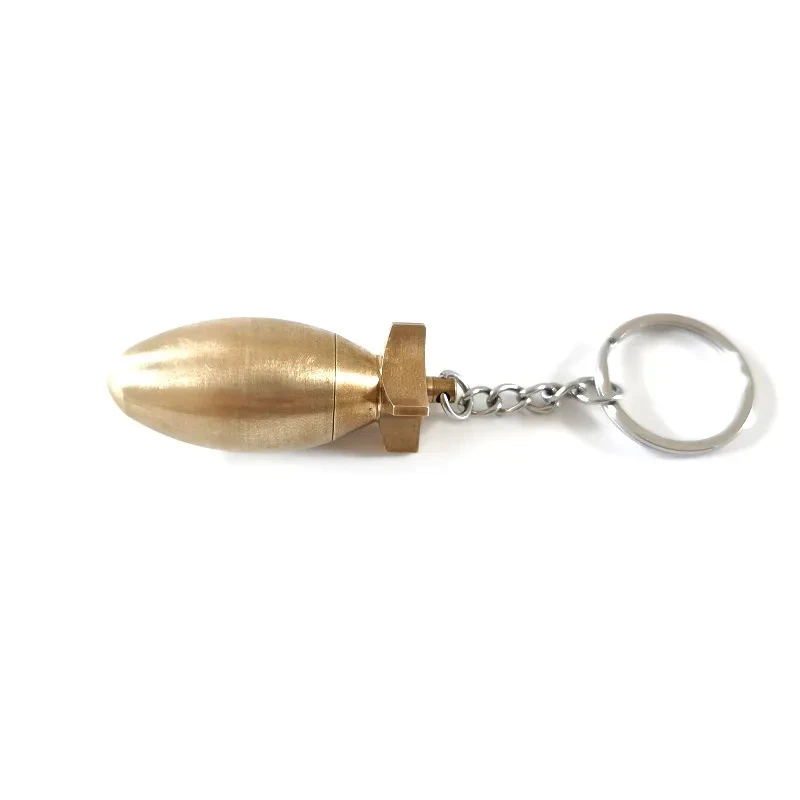 A Brass Bomb Shaped Medicine Bottle Keychain