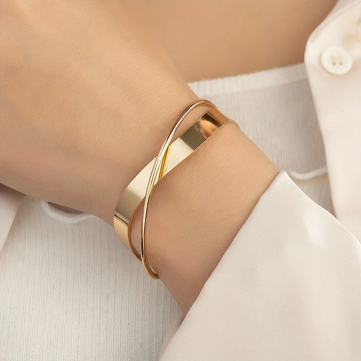 Elegant Golden-Tone Alloy Crossover Bracelet with Smooth Irregular Lines  A Versatile Accessory for Casual or Formal Attire