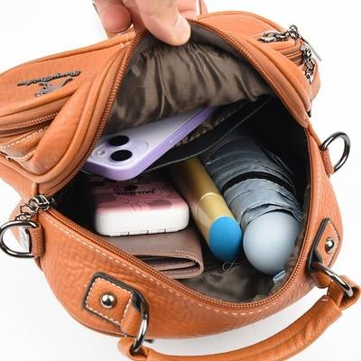 OGEHUAFEE Womens Elegant Mini Backpack Premium PU Crossbody/Backpack Hybrid with Kangaroo Logo & Tassel Accents