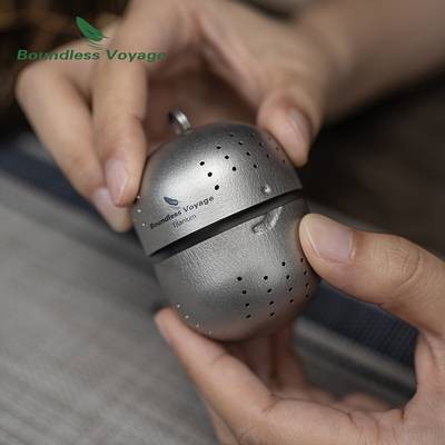 Portable Titanium Tea Infuser Ball with Chain  Perfect for Outdoor Tea Brewing and Loose Leaf Tea Enthusiasts