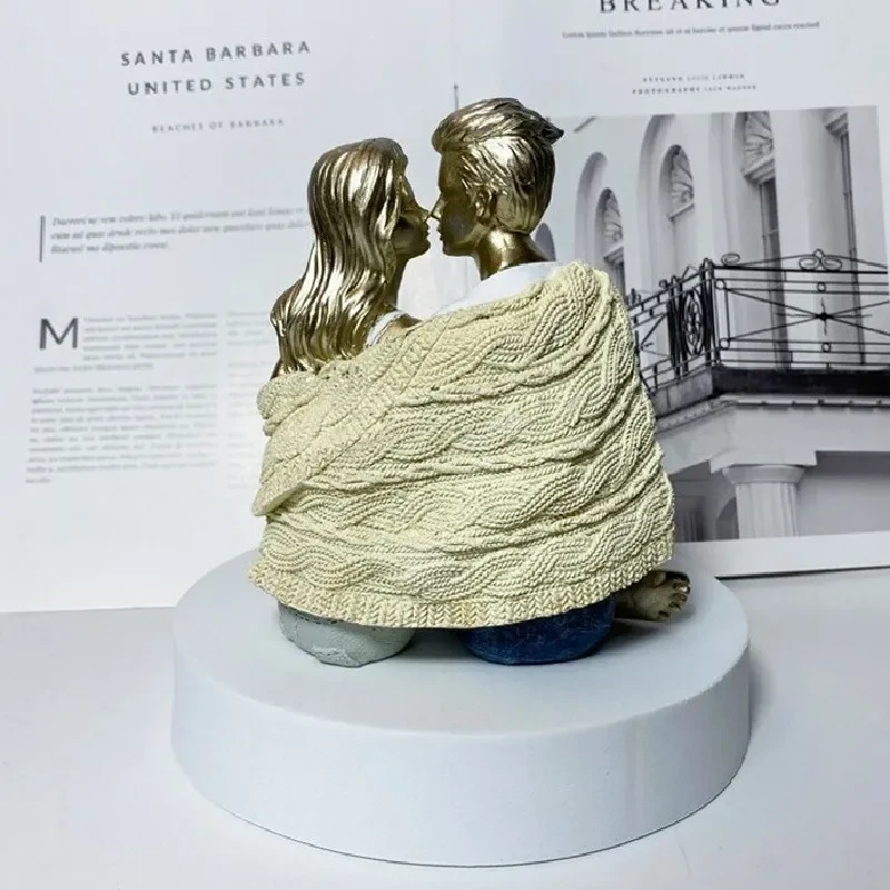 Couple Sitting And Staring At Resin Handicraft Decorative Ornaments