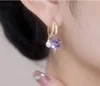 Fashion crystal four-leaf flower pearl earrings