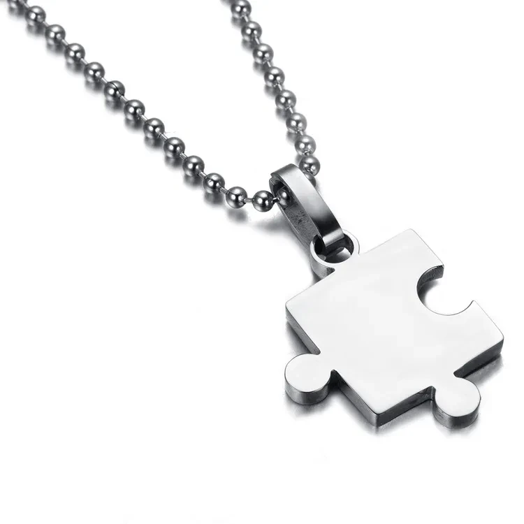Glossy puzzle couple pendant