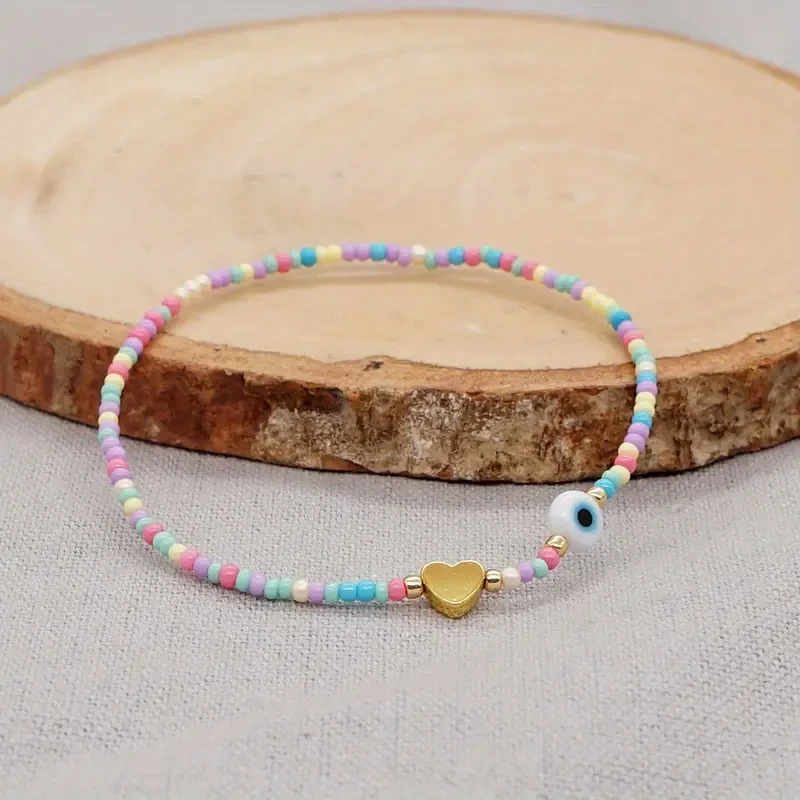 Bohemian Handwoven Glass Bead Bracelet with Heart Charm and Evil Eye Accent, Adjustable Multicolor Strand for Daily Wear and Gift-Giving, No Plating 1PC