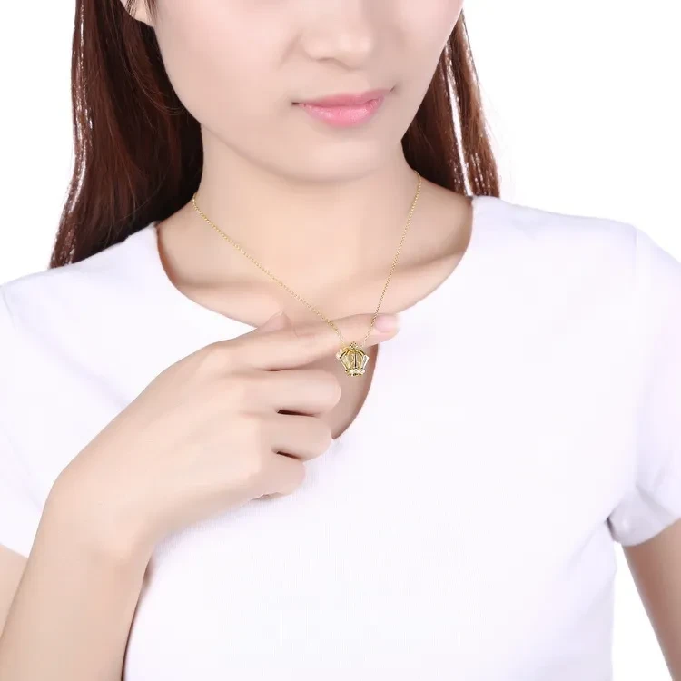 Gold crown pendant