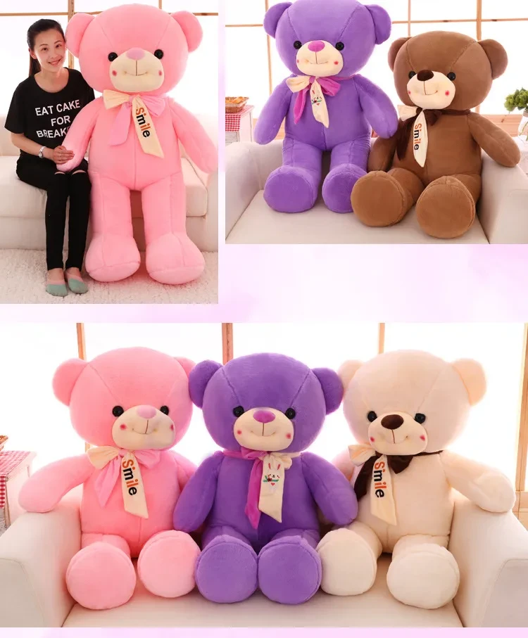 Smiling scarf teddy bear doll