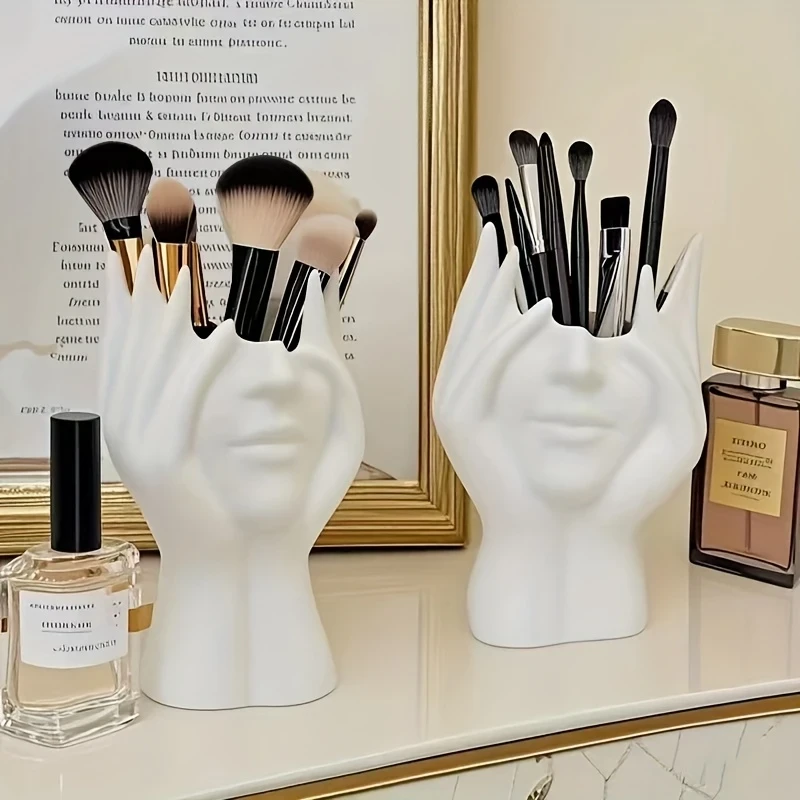 Add elegance to your vanity with the Elegant Human Form Art Makeup Brush Holder. Durable, shatterproof polyresin with a unique hand design, perfect for storing makeup brushes or office supplies.
